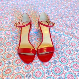Lovely red Michael Kors Patent Leather heels (3”) in size 6.5. Used lightly.